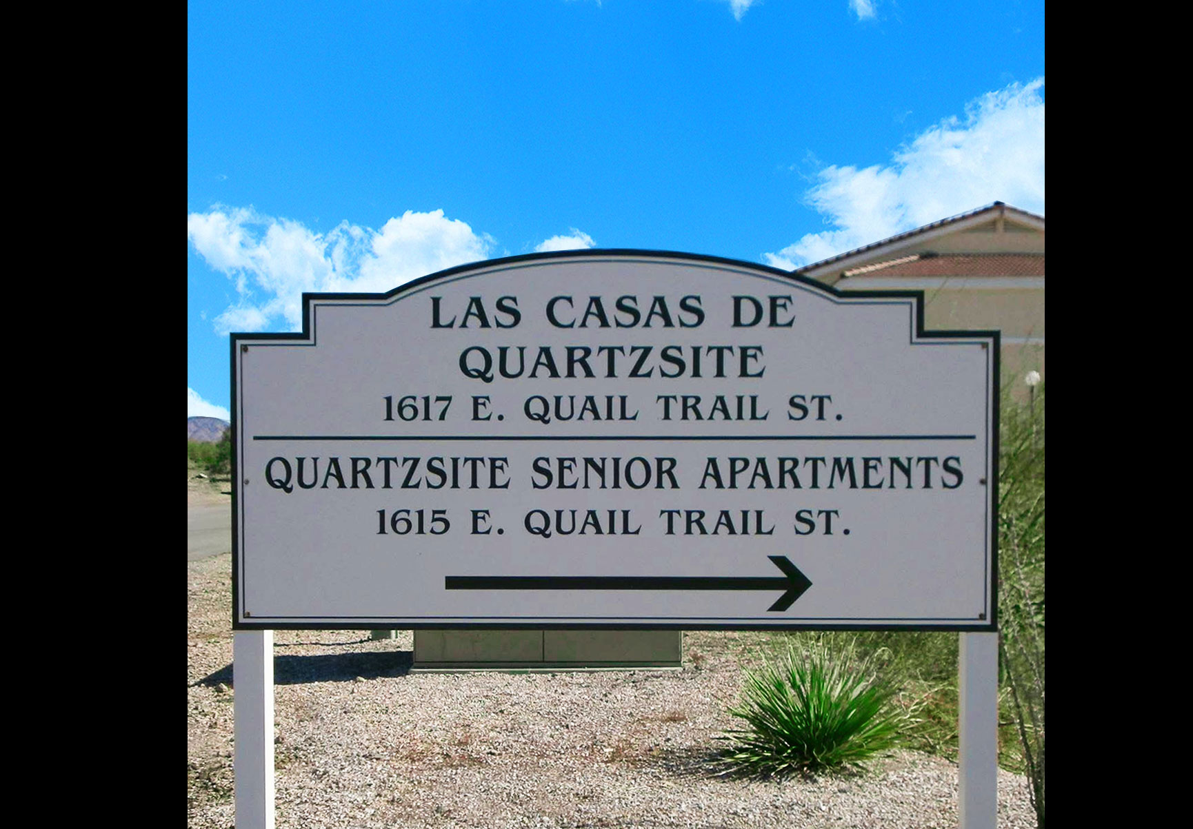 This image displays entrance marker photo of Las Casas de Quartzsite Apartments